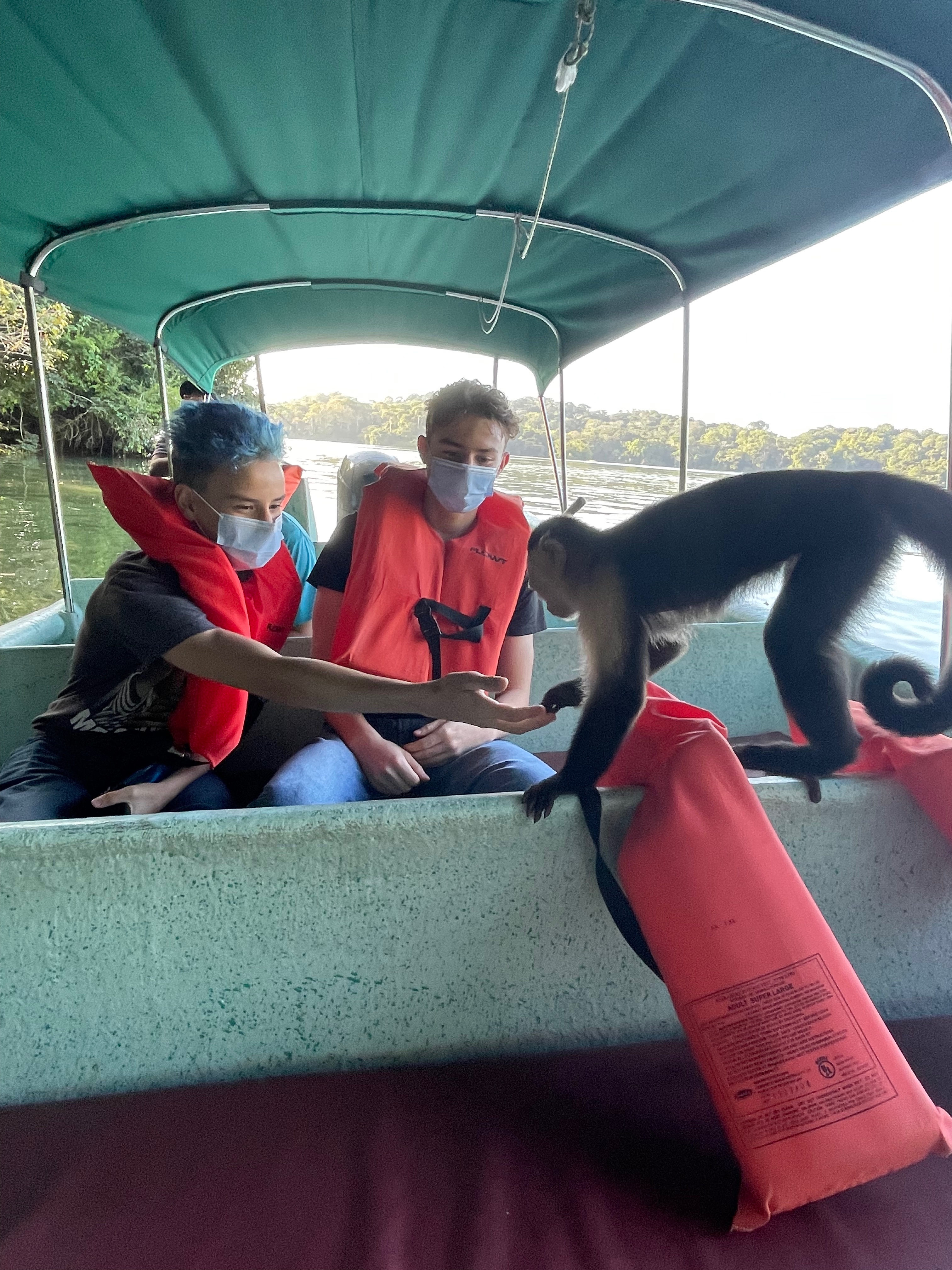 Rhys feeding a monkey at Monkey Island Panamá